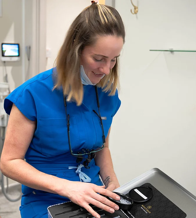 Dental clinician preparing a Boutique Whitening treatment at the practice